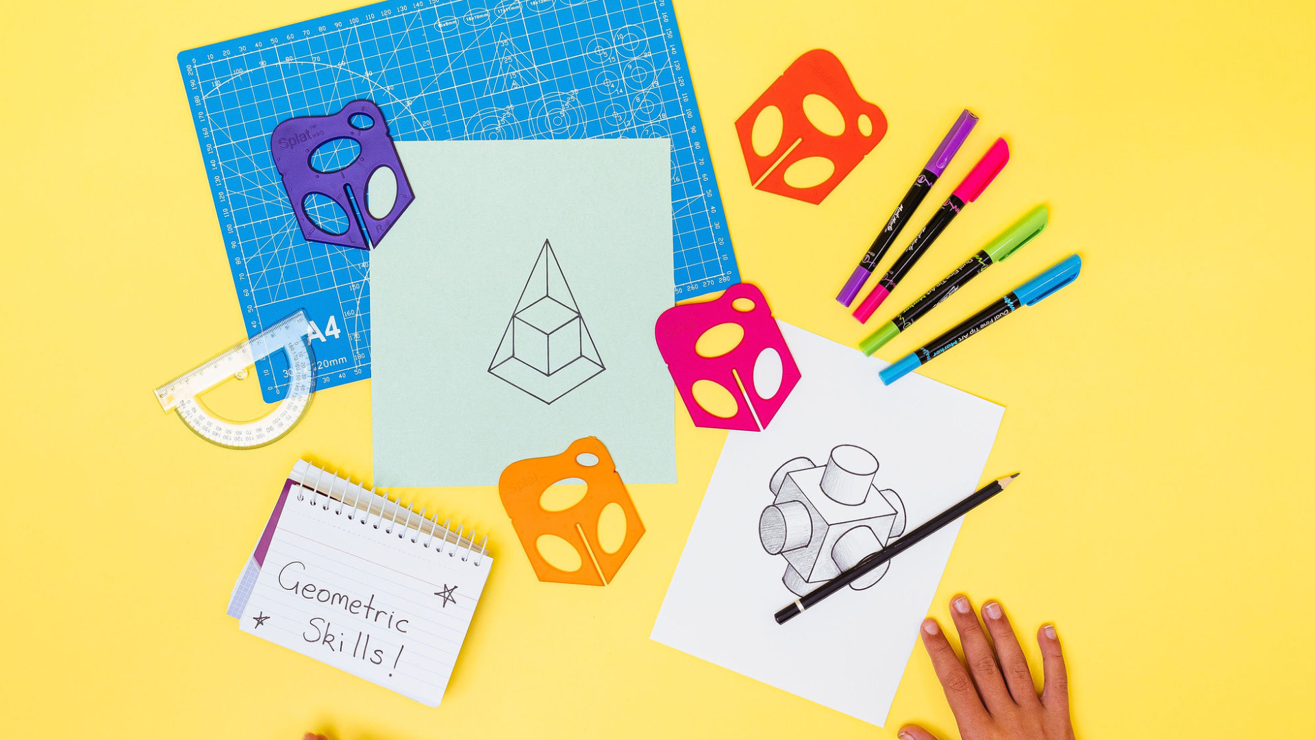 Child drawing geometric shapes with pencils and 3d drawing tools.
